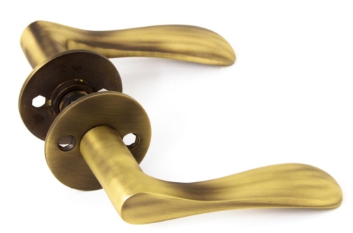 Dørgreb Earth Antik messing med rosetter cc30 og nøglehuller