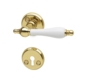 Brass door handles with porcelain.